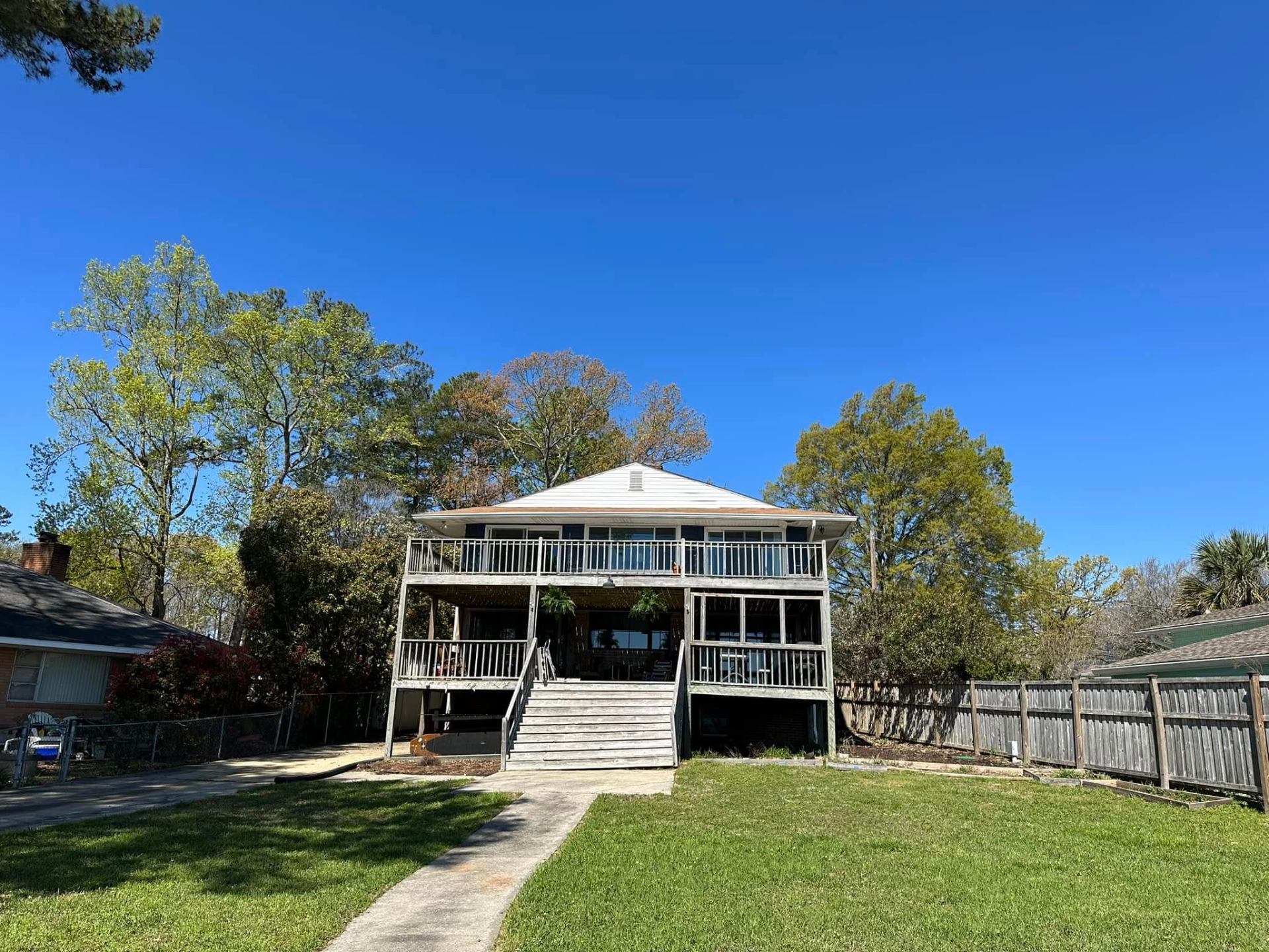 Deck before restoration - weathered wood